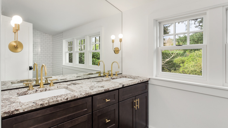 gold lighting in bathroom