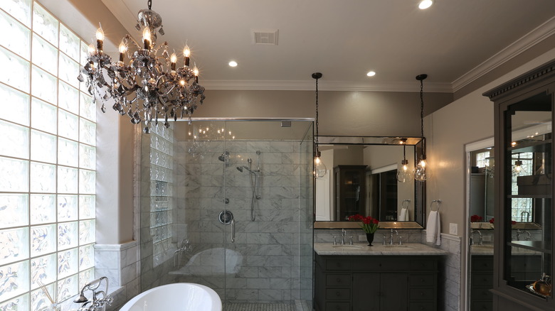 traditional chandelier in bathroom