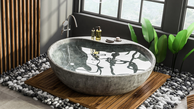 stone bathtub filled with water