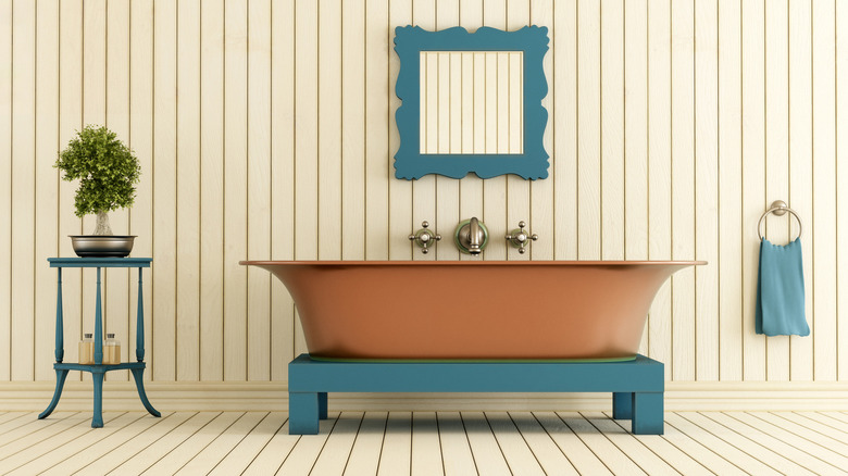 bathroom with a copper bathtub