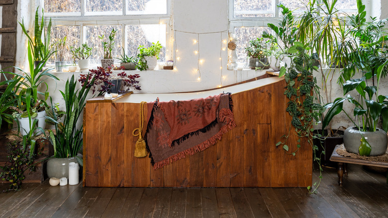 room with a wooden bathtub