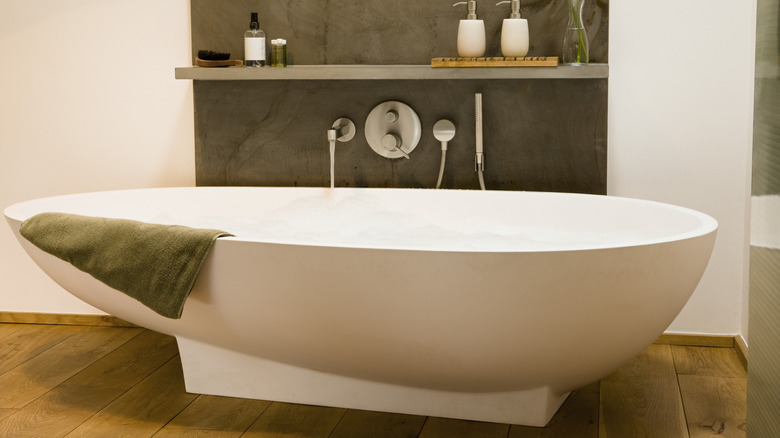 bathroom with a white bathtub