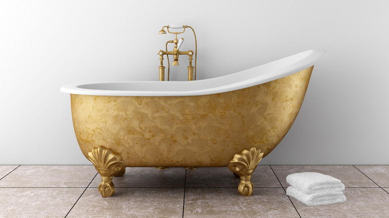 gold clawfoot bathtub