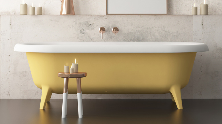 room with a yellow bathtub