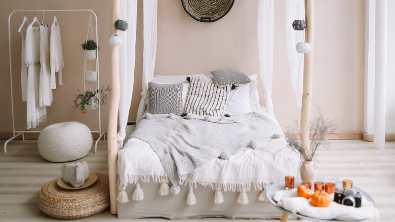 boho room with canopy bed 