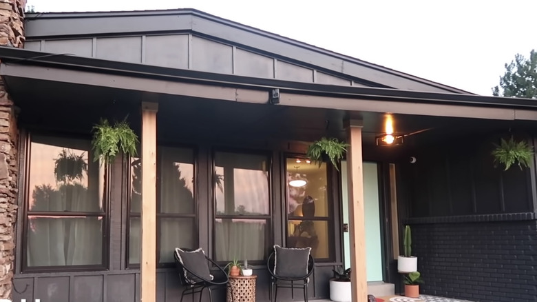 Sleek black and walnut porch