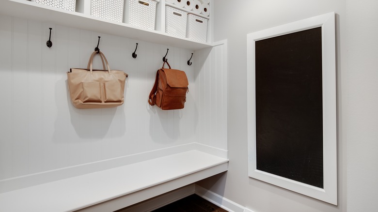 white entryway floating bench