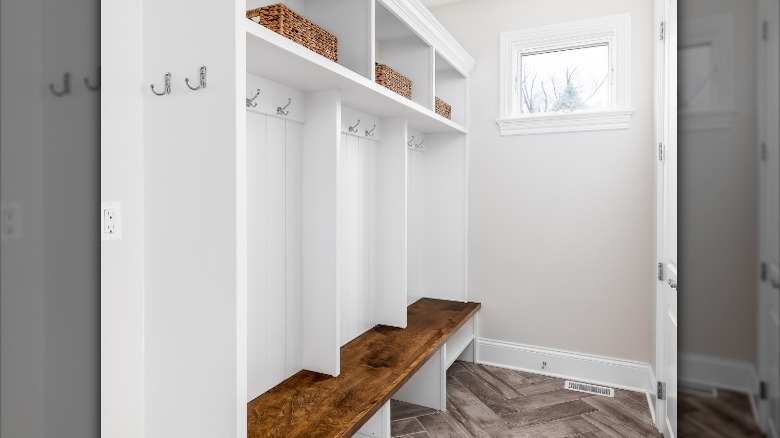 white and wooden mudroom bench