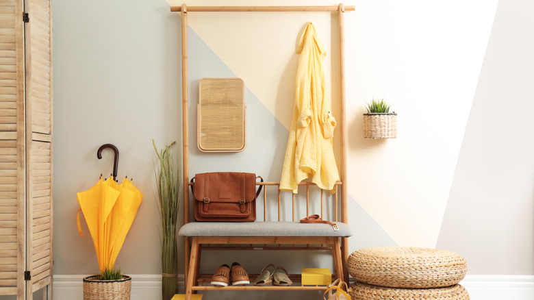 entryway gray and wooden bench 