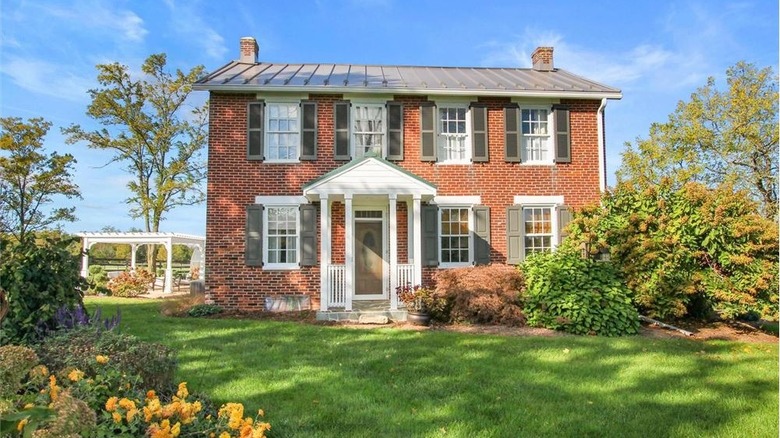 Red brick colonial home exterior