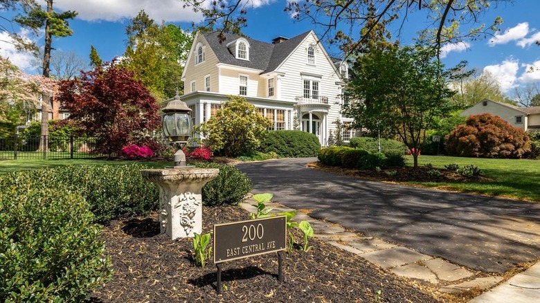 Large white colonial home exterior