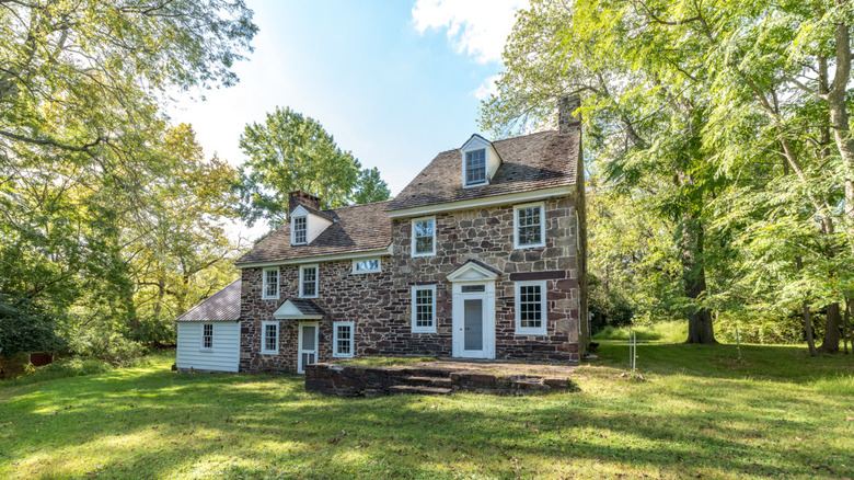 Stone colonial home exterior