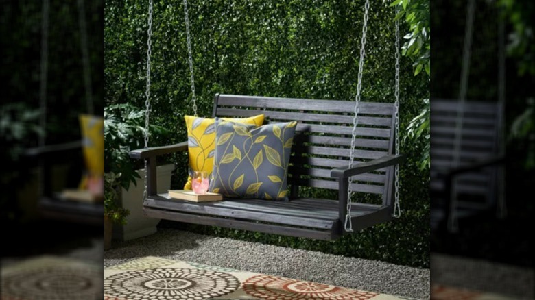 Gray porch swing