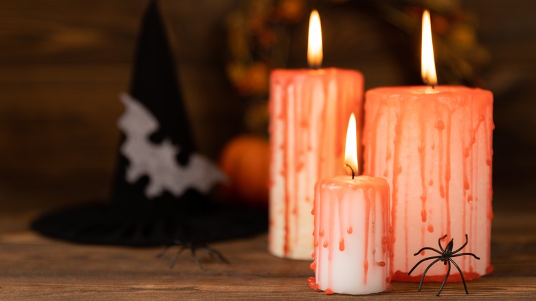 red and white dripping candles