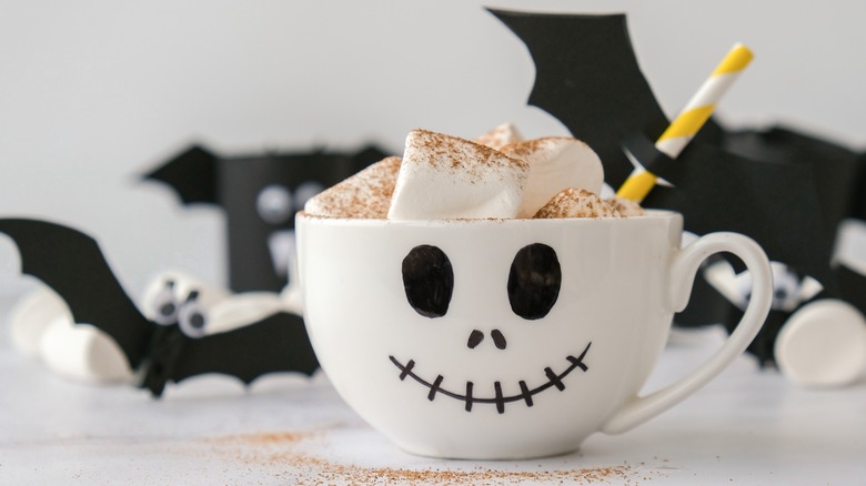 skeleton mug with bat straw