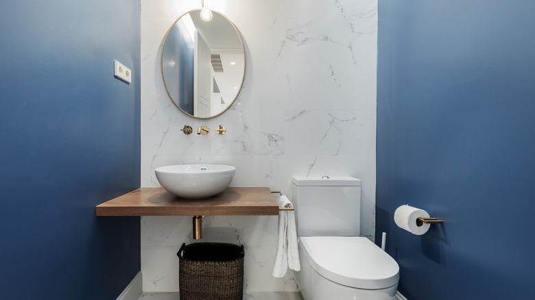 floating wood countertop in bathroom