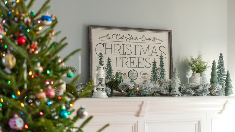 Christmas trees sign on mantel