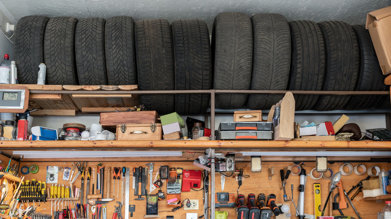 tires above garage workbench