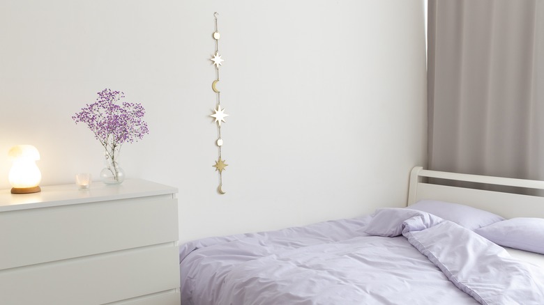 lilac bedroom with gold accents