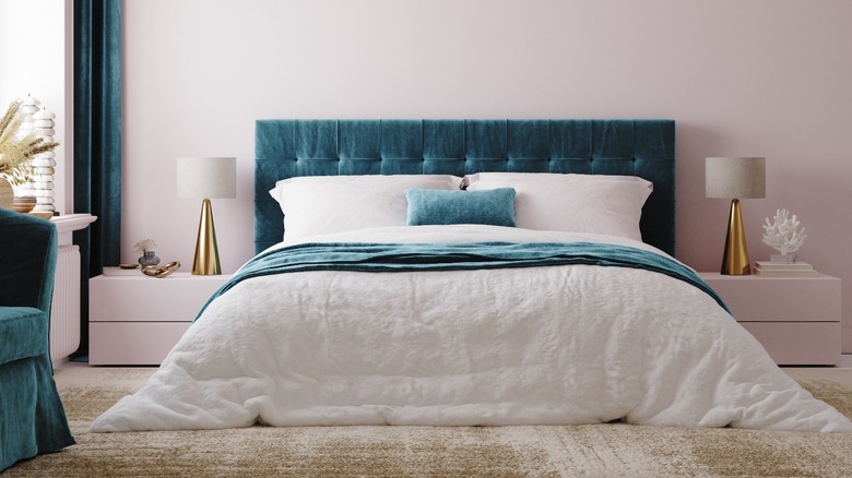 Teal upholstered headboard bed