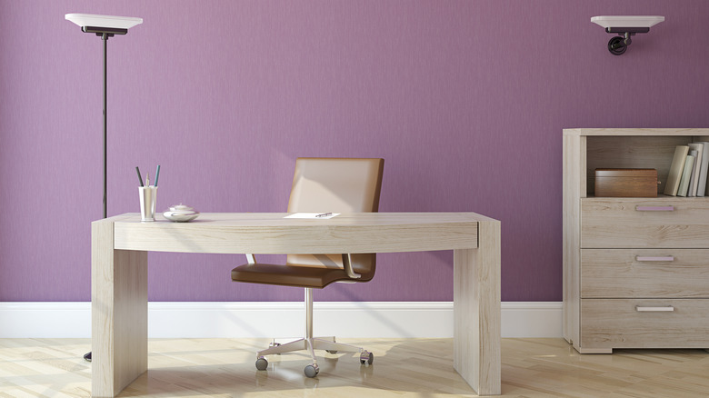 lilac wall behind desk