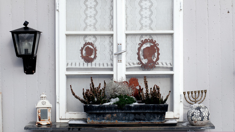 window box styled with snow