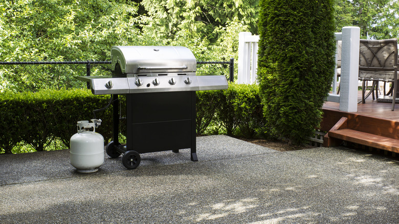 concrete patio with grill