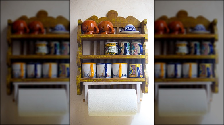 vintage shelf holding mugs