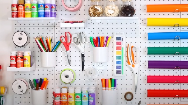 pegboard with art supplies