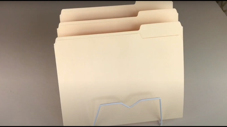 filed folders in rack
