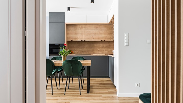 green velvet chairs in kitchen