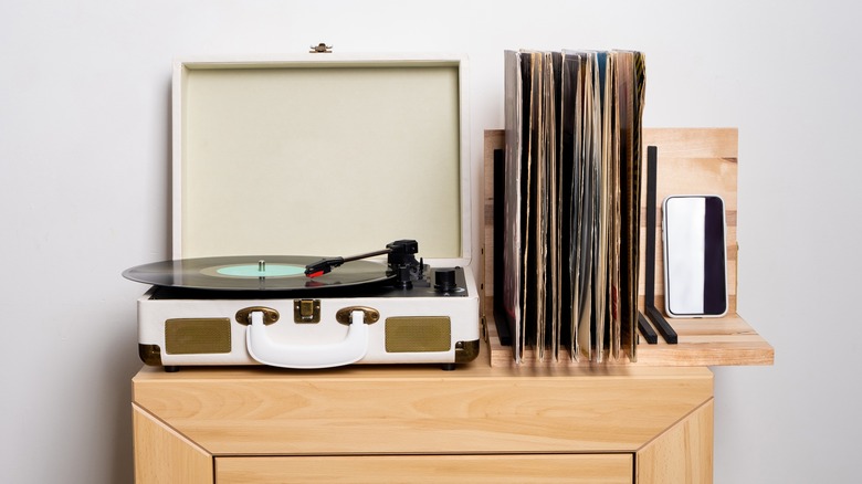 records in a wooden holder