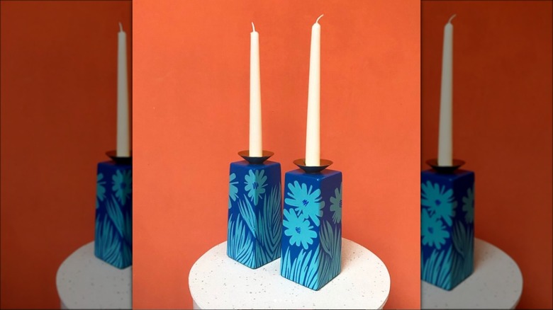 blue painted wood candlesticks