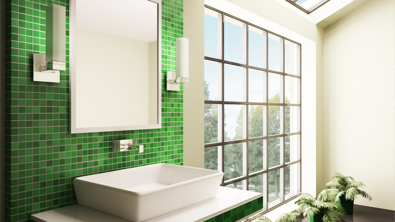 green tile wall in bathroom 