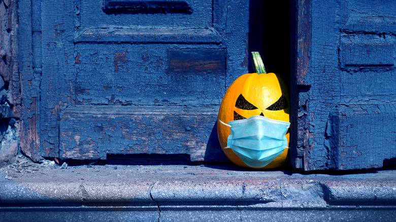 jack-o-lantern with mask