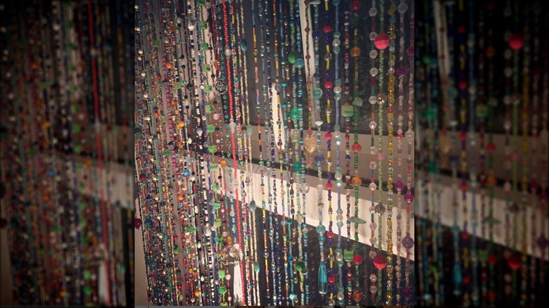 beaded curtain against window