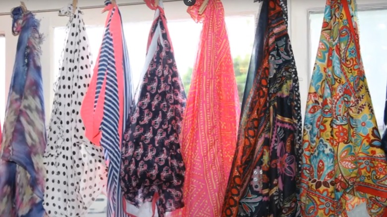 shawls tied over window