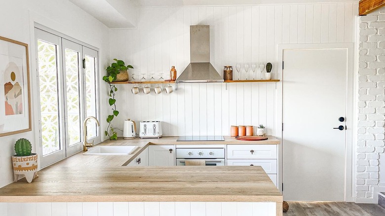 Floating shelves in kitchen