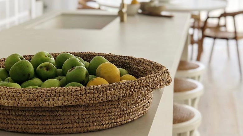 Wicker bowl of limes