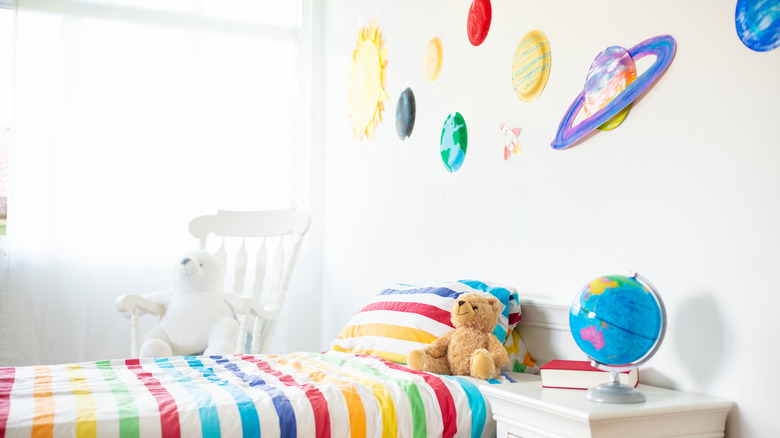 a colorful space-themed bedrom 