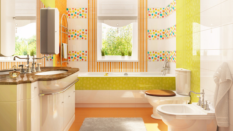 bathtub with colorful tiles