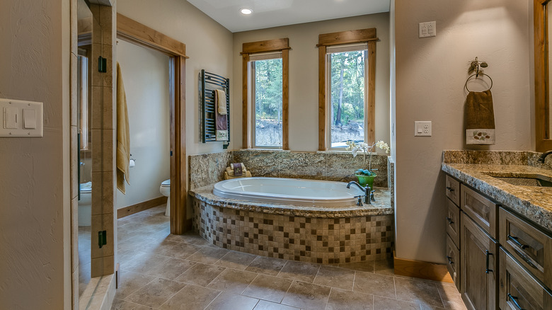 bathtub with mosaic tiles