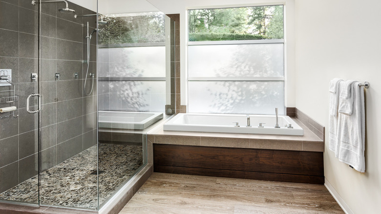 bathroom with wood and tile