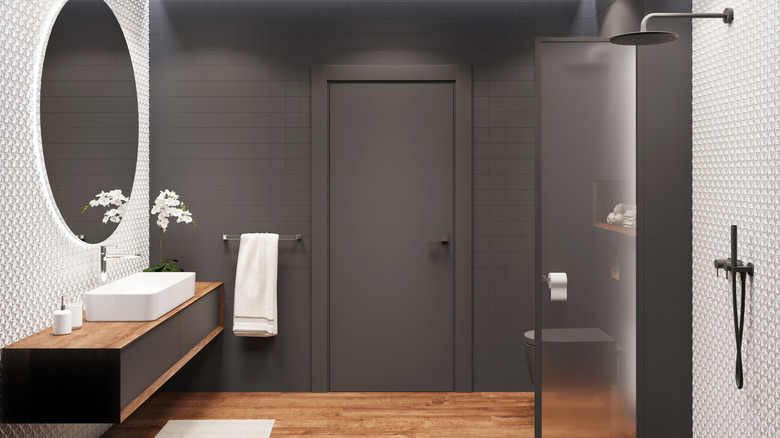 doorless bathroom shower with small divider