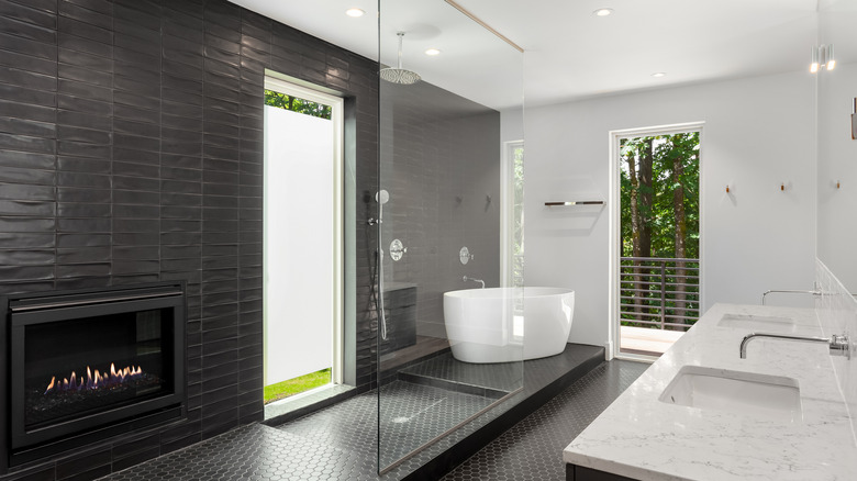 doorless shower with fireplace and window