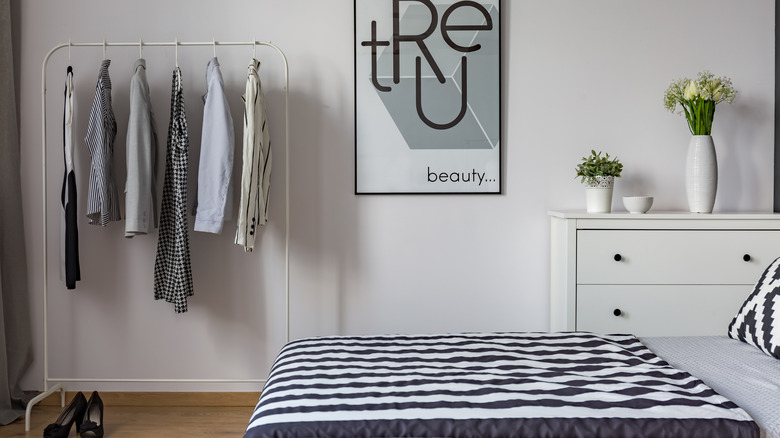 garment rack in bedroom