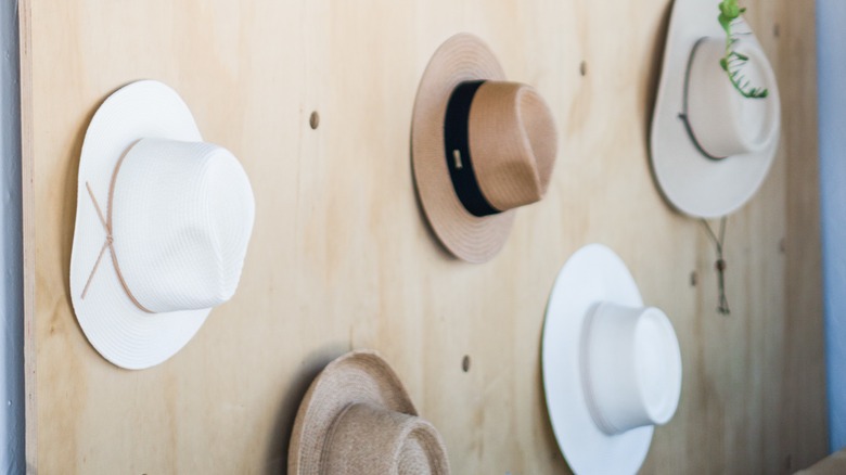 Hats hanging on wall