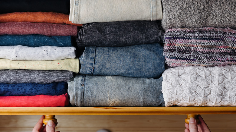 Drawer of folded clothing