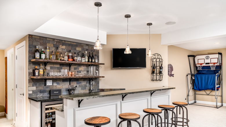 basement bar with light pendants