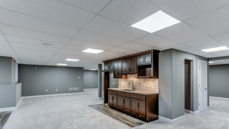 basement with drop ceiling panels